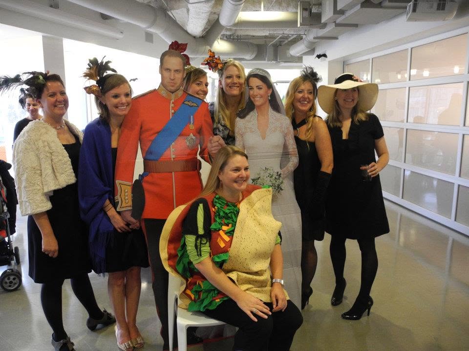 Allrecipes coworkers dressed for an elaborate royal wedding office party